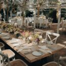 a large room with tables set for a wedding