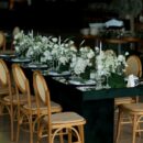 Elegant table setting with white floral arrangements